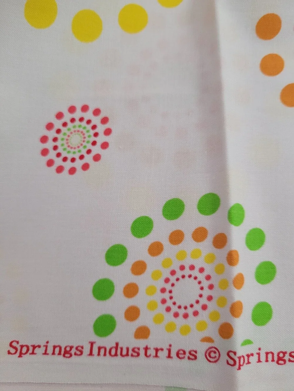 Spring Industries White Sewing Fabric with Colorful Dot Burst Pattern (1519)